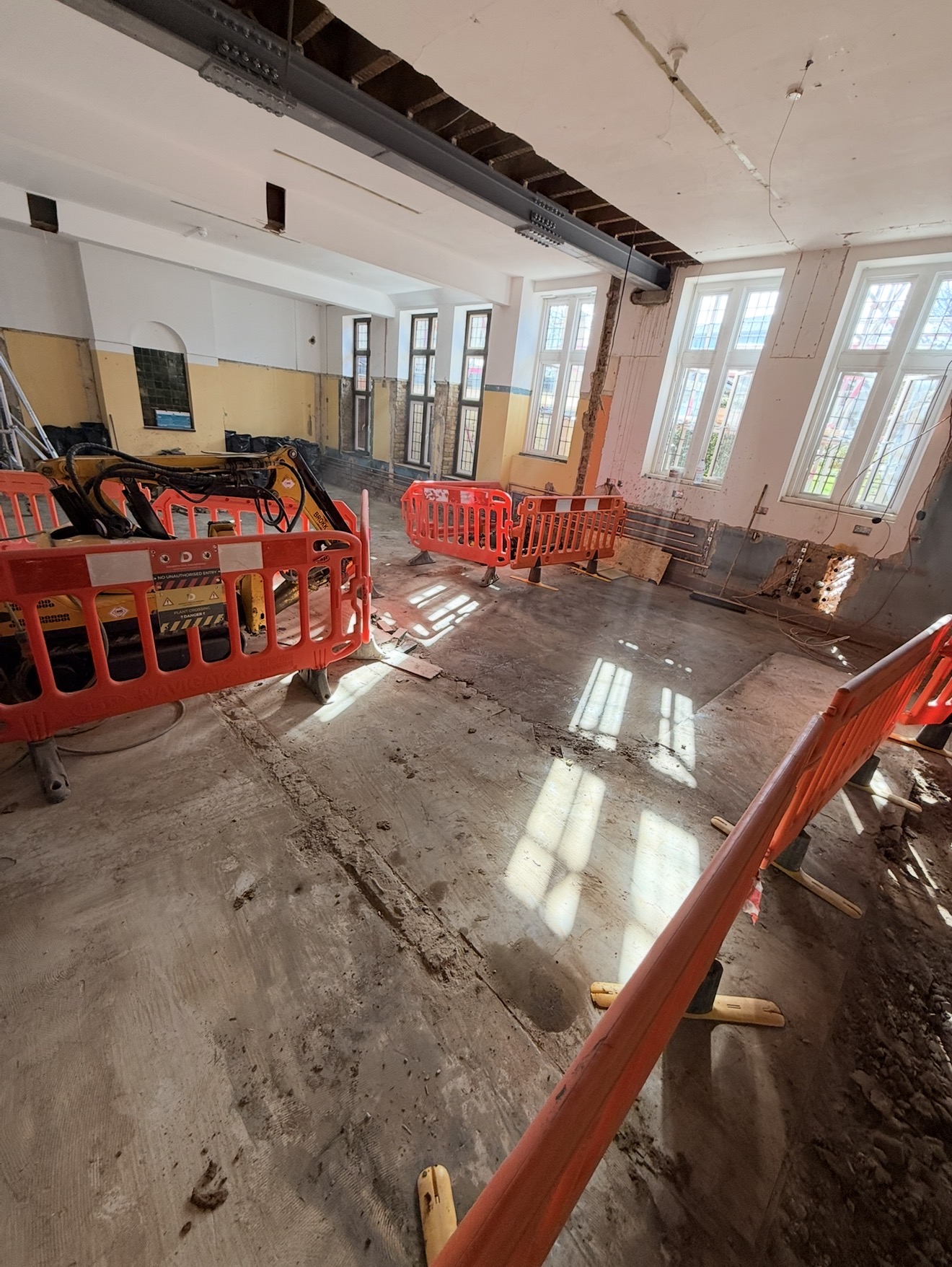 Barriered internal work zones beneath the new steel beams at Bishop Stortford