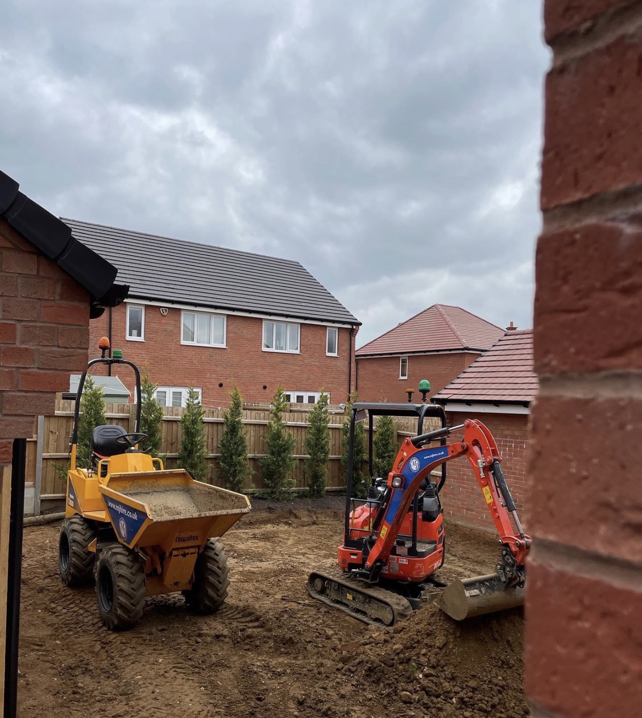 Groundworks and level alterations with excavator and dumper at Buckton Fields