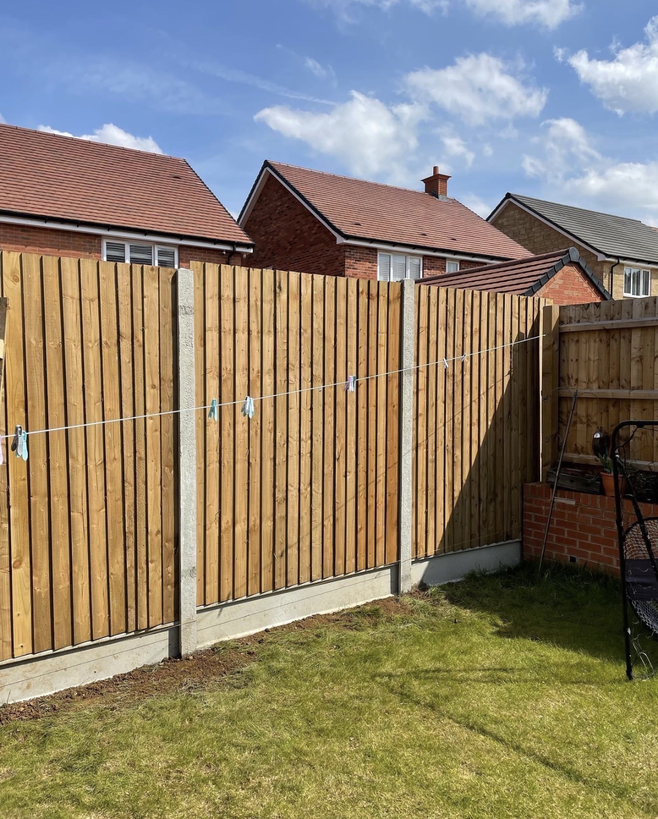 New boundary fencing with concrete posts and gravel boards at Buckton Fields