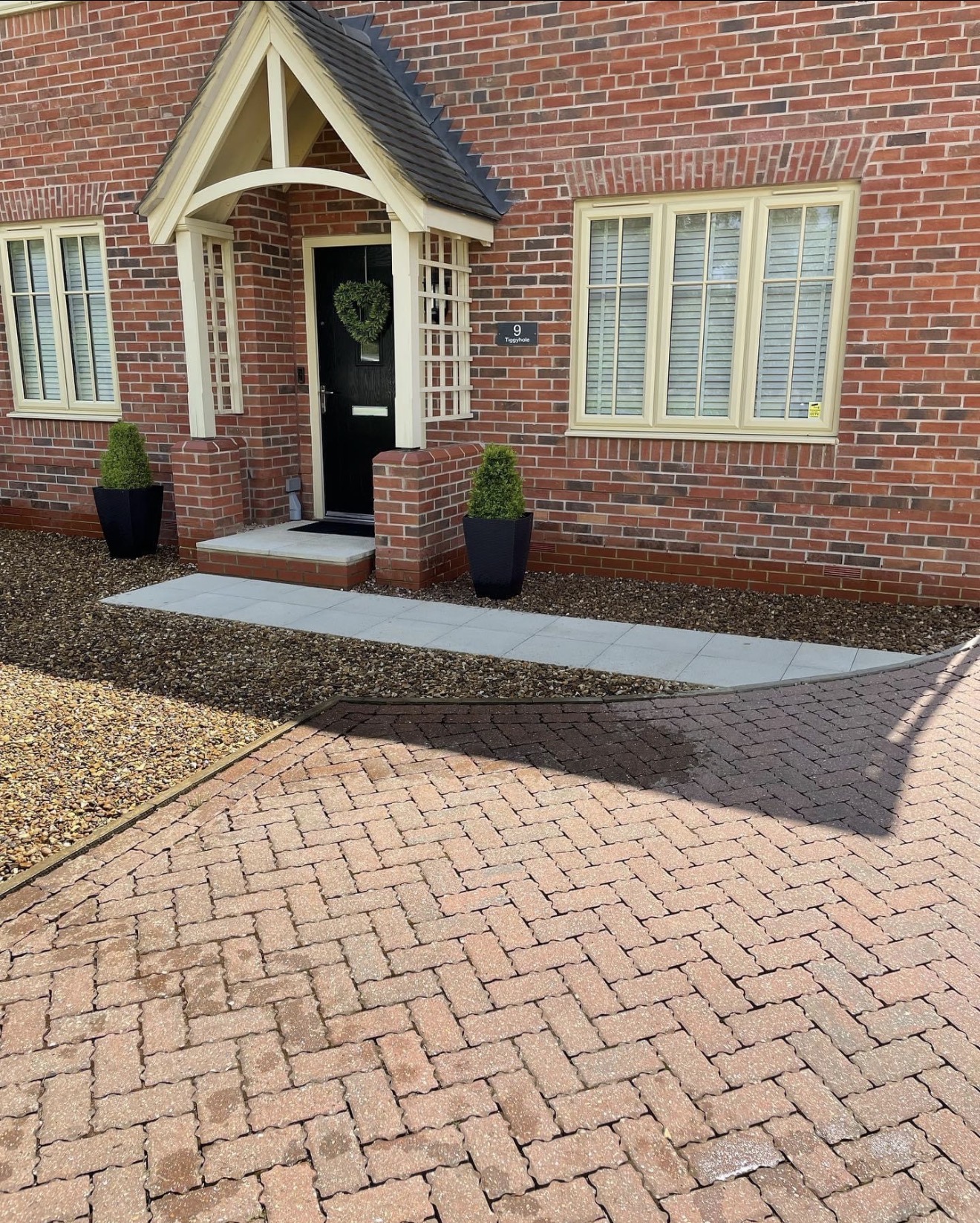 Block paving and paved pathway leading to the new entrance step in Northampton